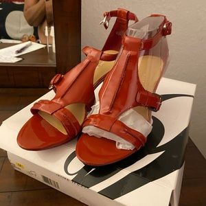 Orange Nine West shoe.